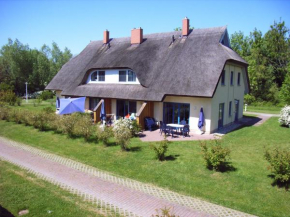Гостиница Reetdachhaus Malve 2 mit Kamin für bis zu 6 Personen  Позериц